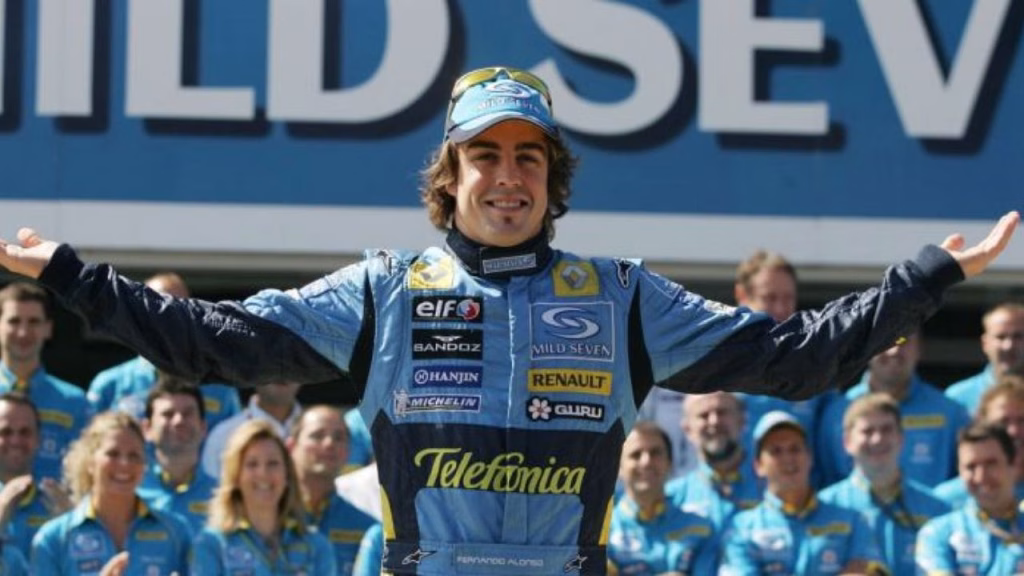 Fernando Alonso Celebrating on the Podium in Renault Overalls